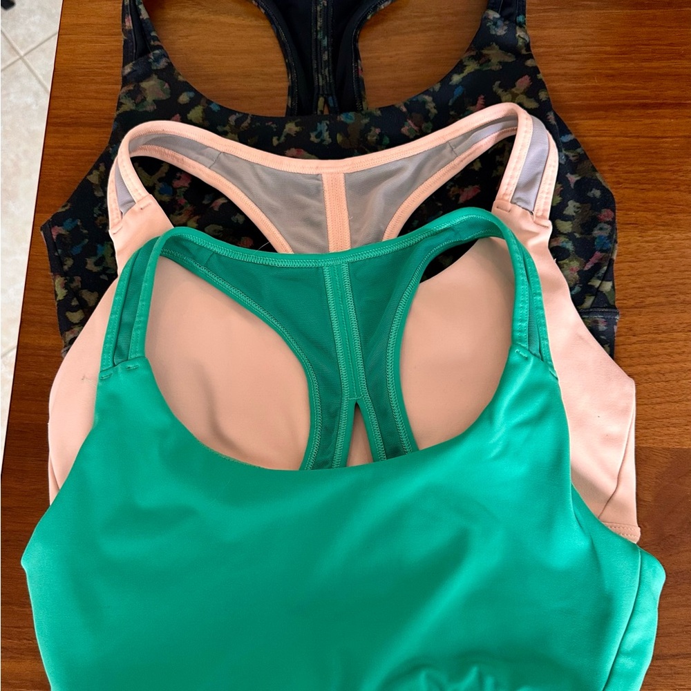 Three Athleta Sports Bras